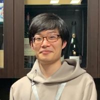 古越 彩人